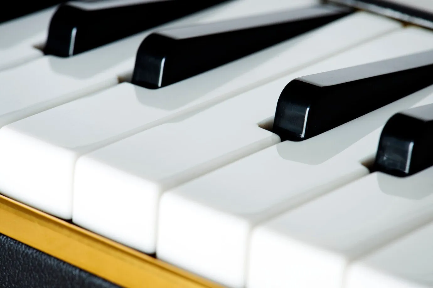 A close-up of black and white piano keys