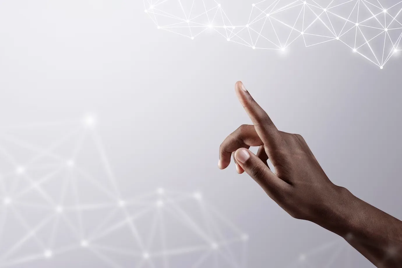 A hand reaching up towards a glowing network of connected nodes