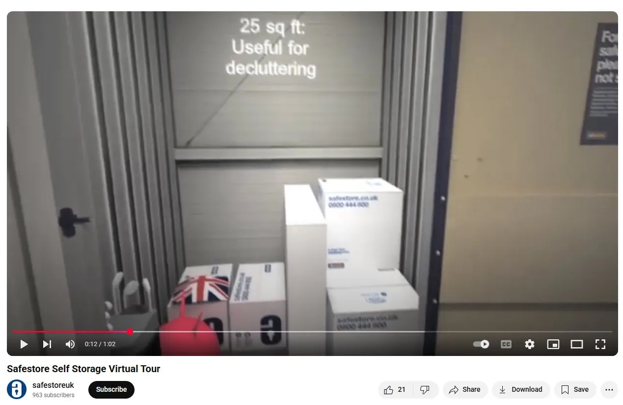 A YouTube virtual tour video showing the inside of a storage unit with boxes