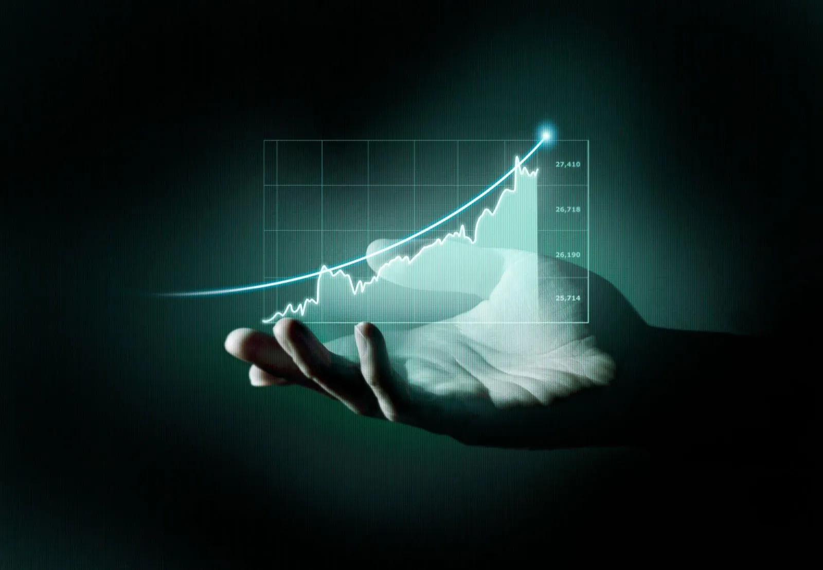 An open hand beneath a glowing upward-trending line graph